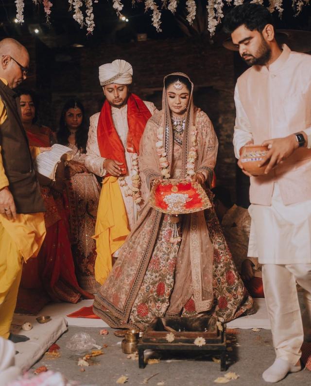 Bride Ginni Malik with her groom