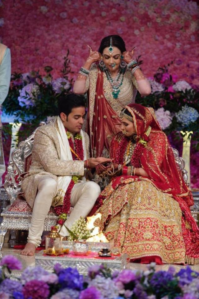 Nita Ambani with son Akash and daughter in law Shloka Mehta